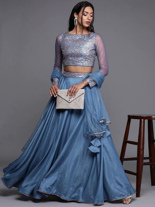https://www.inddus.in/cdn/shop/products/blue-silver-toned-embellished-sequinned-semi-stitched-lehenga-unstitched-blouse-with-dupatta-390831.webp?v=1658232426