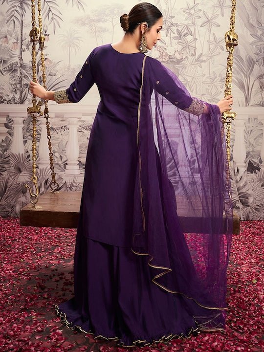 Purple, gold toned kurta & trousers with dupatta Kurta design: A-line shape  Regular style Round neck, short regular sleeves Sequinned de