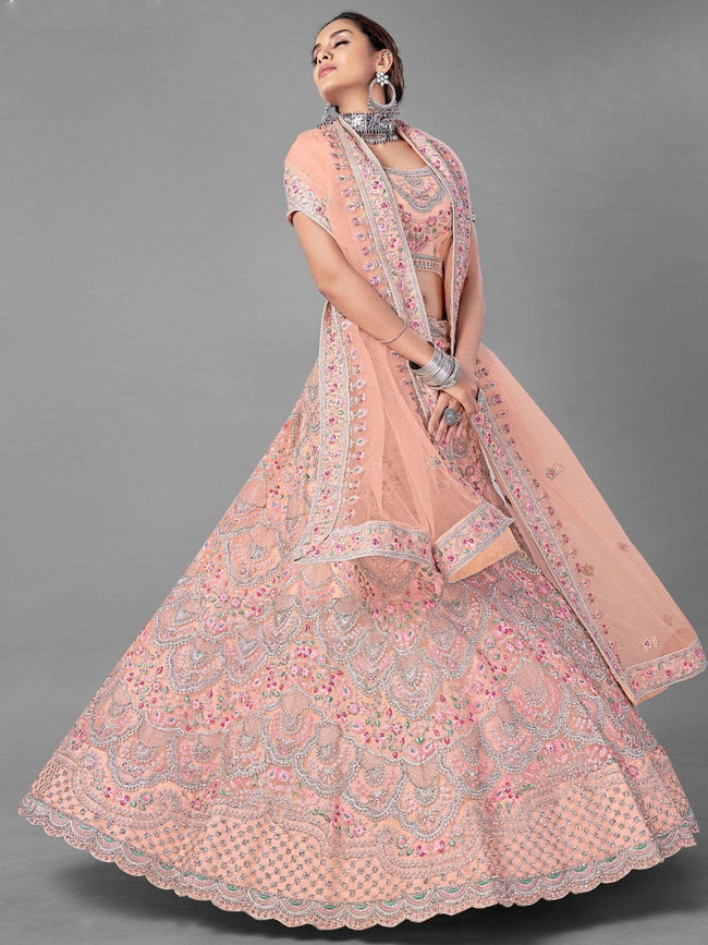 Celebrate the enchantment of feminine grace in this dreamy peach-pink  lehenga. where embroidery meets the sheer elegance of a flowing ca... |  Instagram