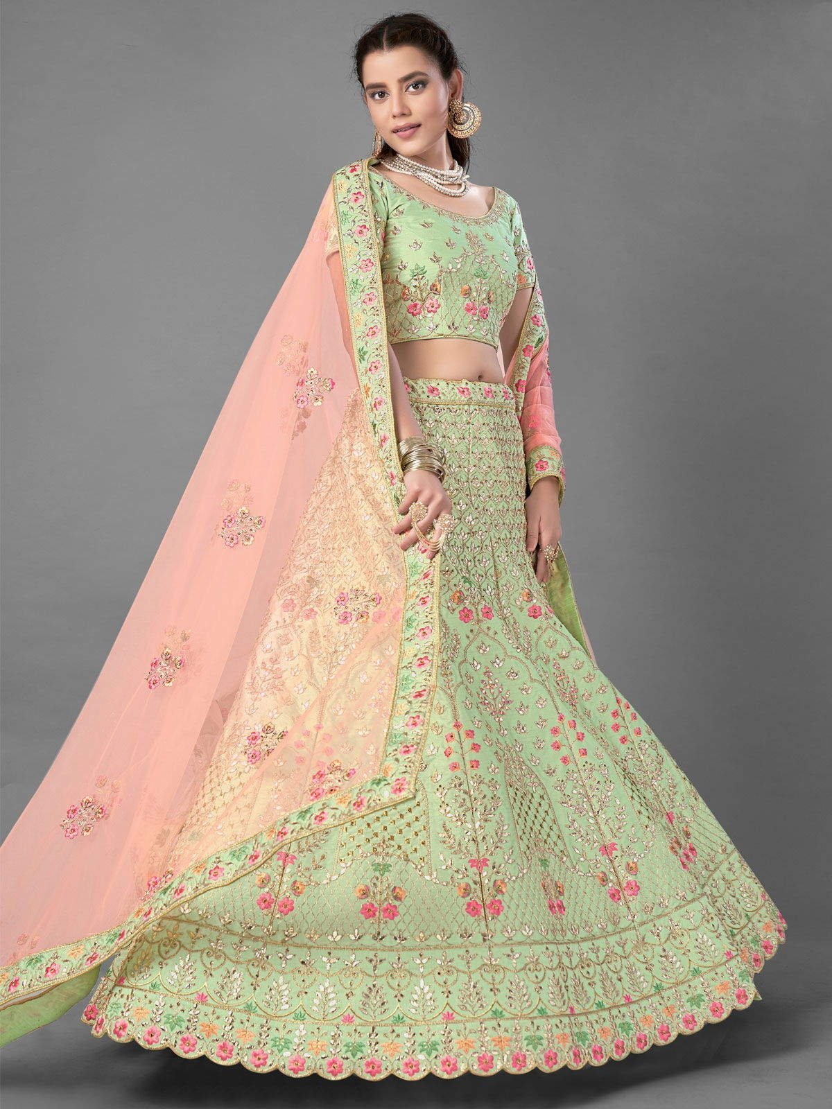 Sumptuous Stone And Zari Work Peach Color Crepe Fabric Lehenga Choli