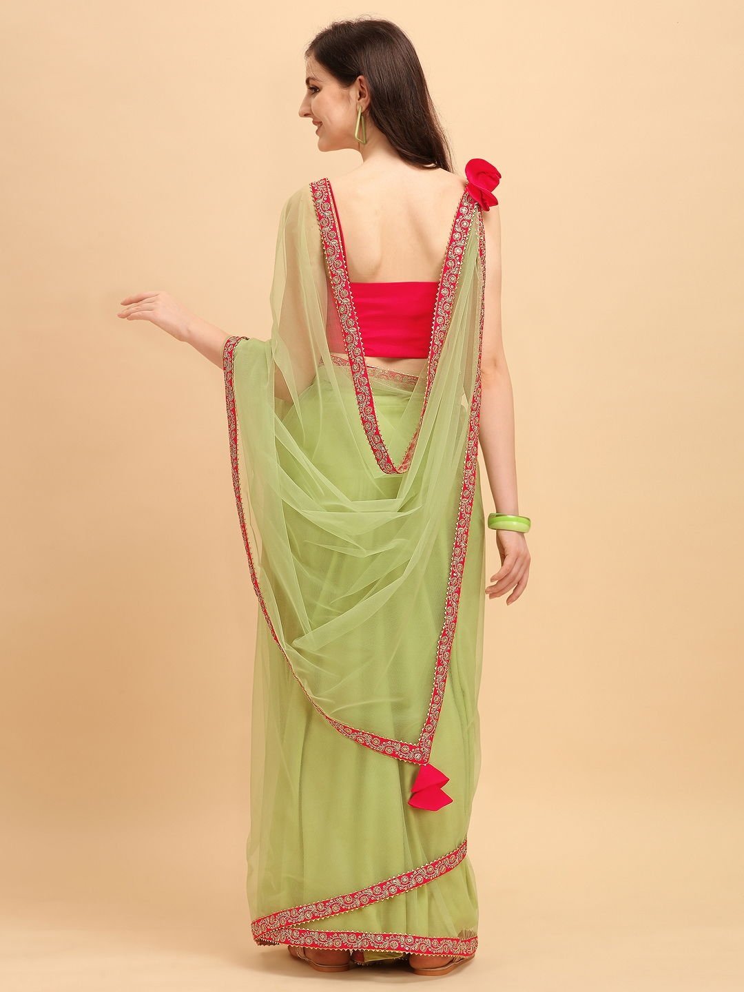 Pista green embroidered saree with pink blouse Design by Aharin India at  Pernia's Pop Up Shop 2024