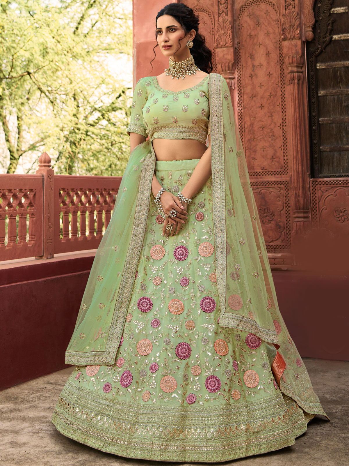 Featuring peach and pista green designer party wear lehenga set with  embroidery on top and bottom.… | Netted blouse designs, Party wear lehenga,  Kurta designs women